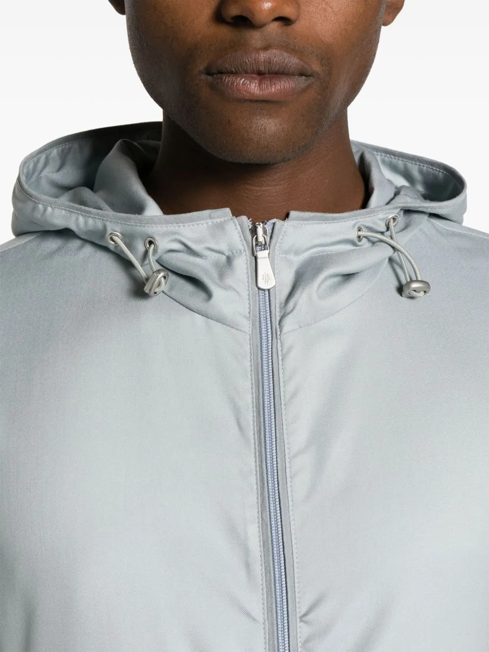 Giacca leggera con cappuccio in azzurro - uomo