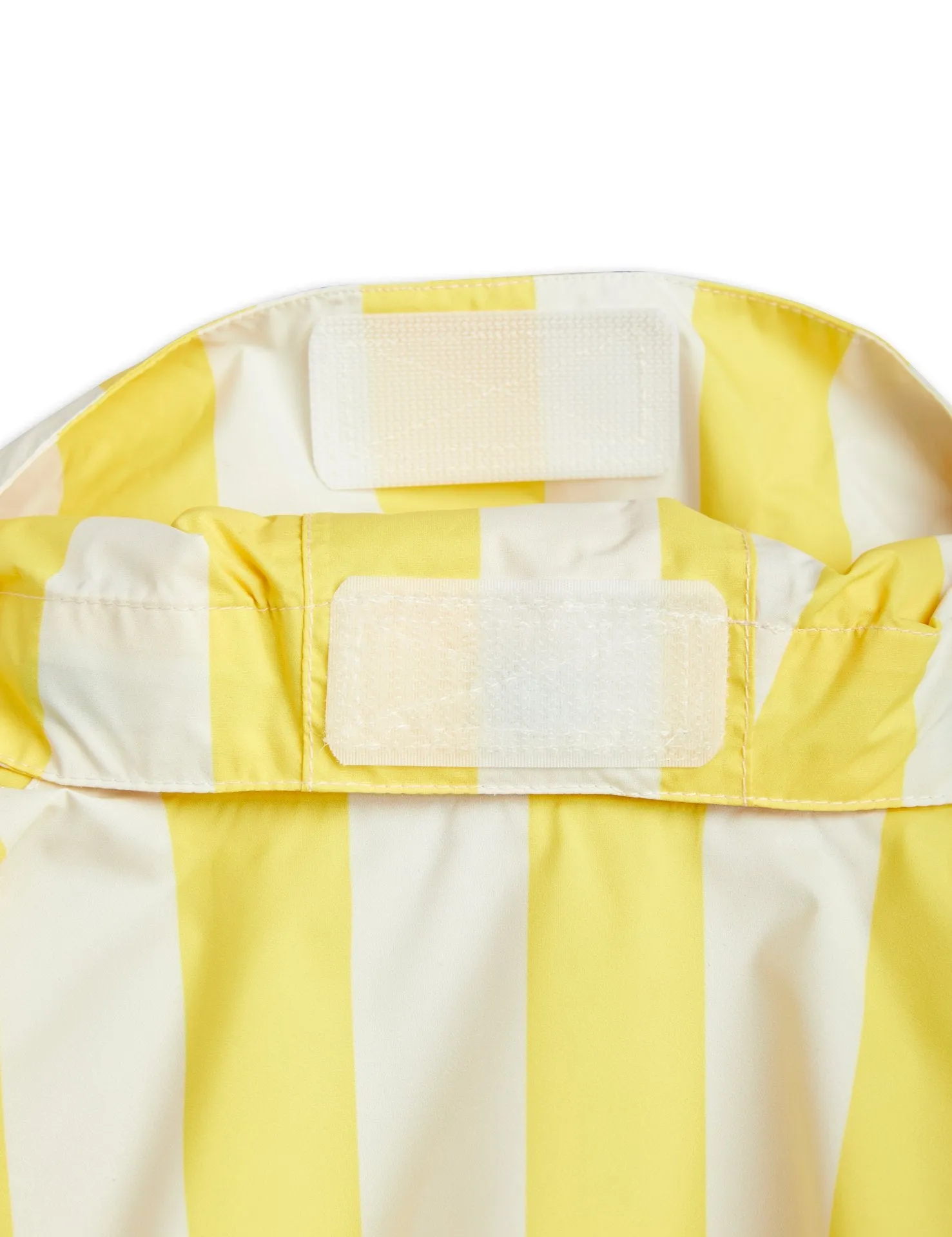 Giubbino a righe giallo con applicazione pellicano per bambini