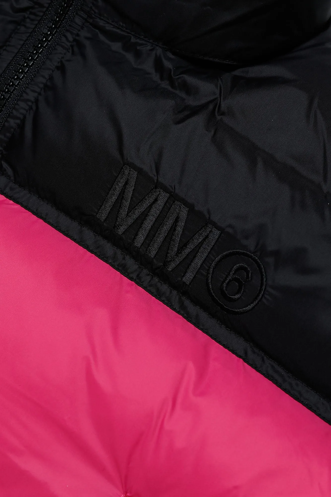 Giubbino round bicolore fuxia-nero per bambina