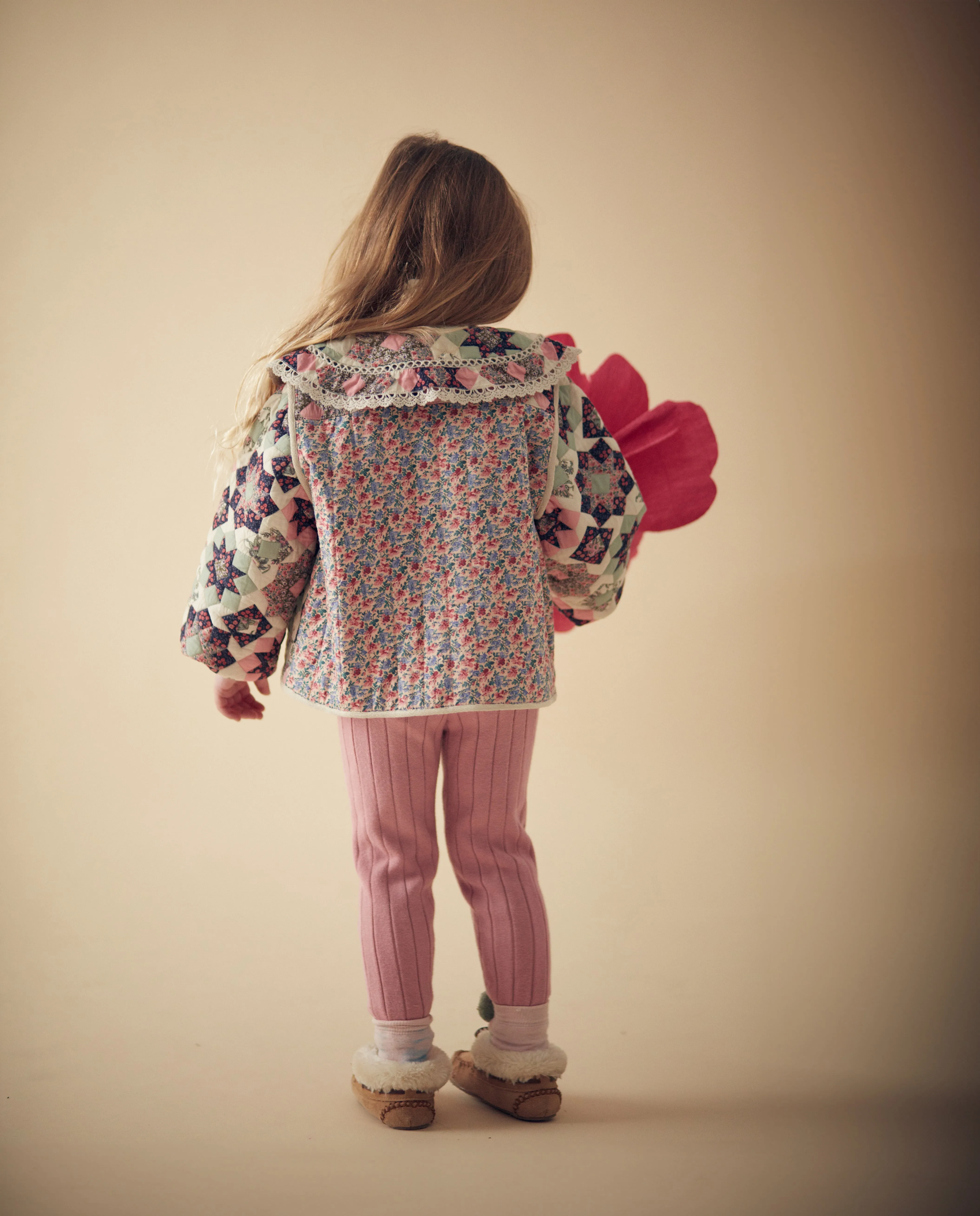 Giubbino trapuntato con stampa floreale per neonata e bambina