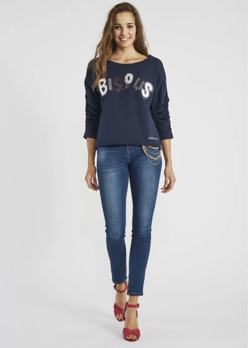 Jeans jeggings con catena