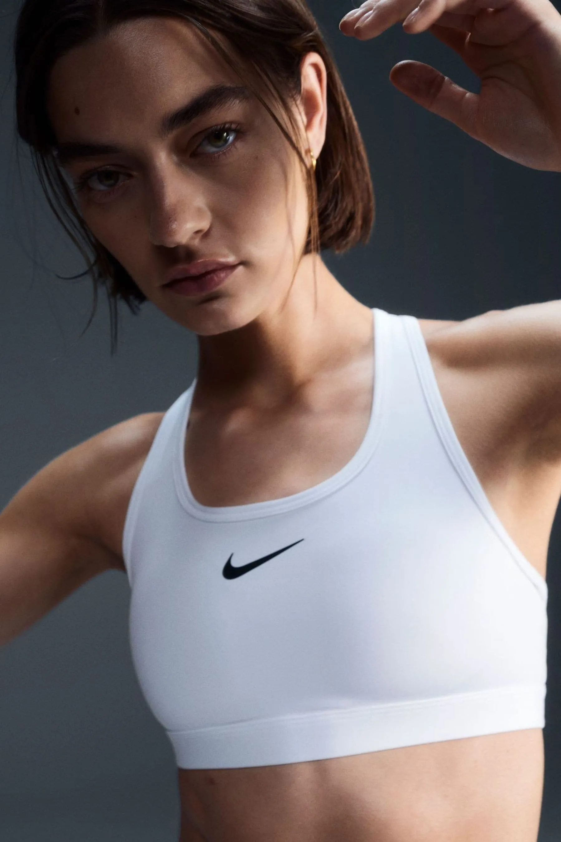 Nike - Reggiseno sportivo imbottito sostegno medio con logo