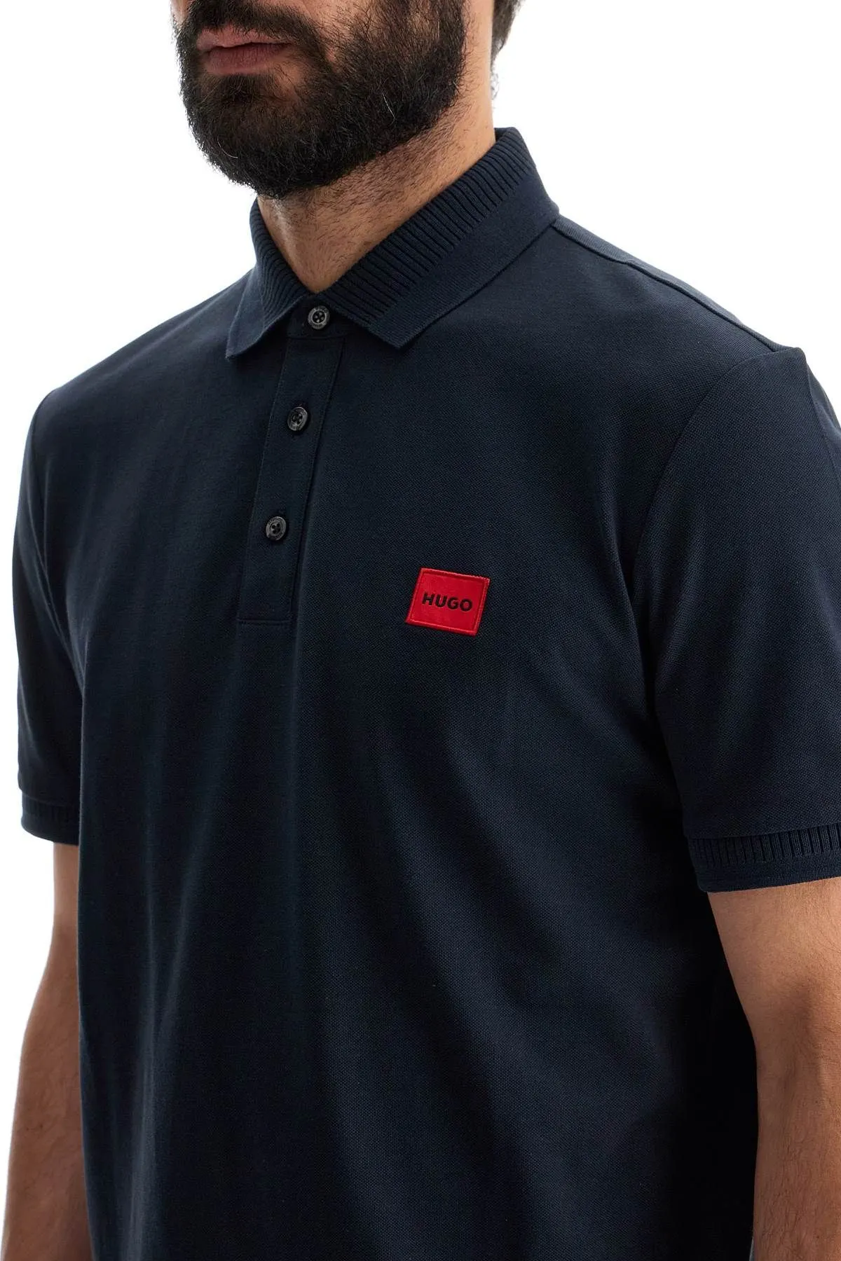 Polo con etichetta logo