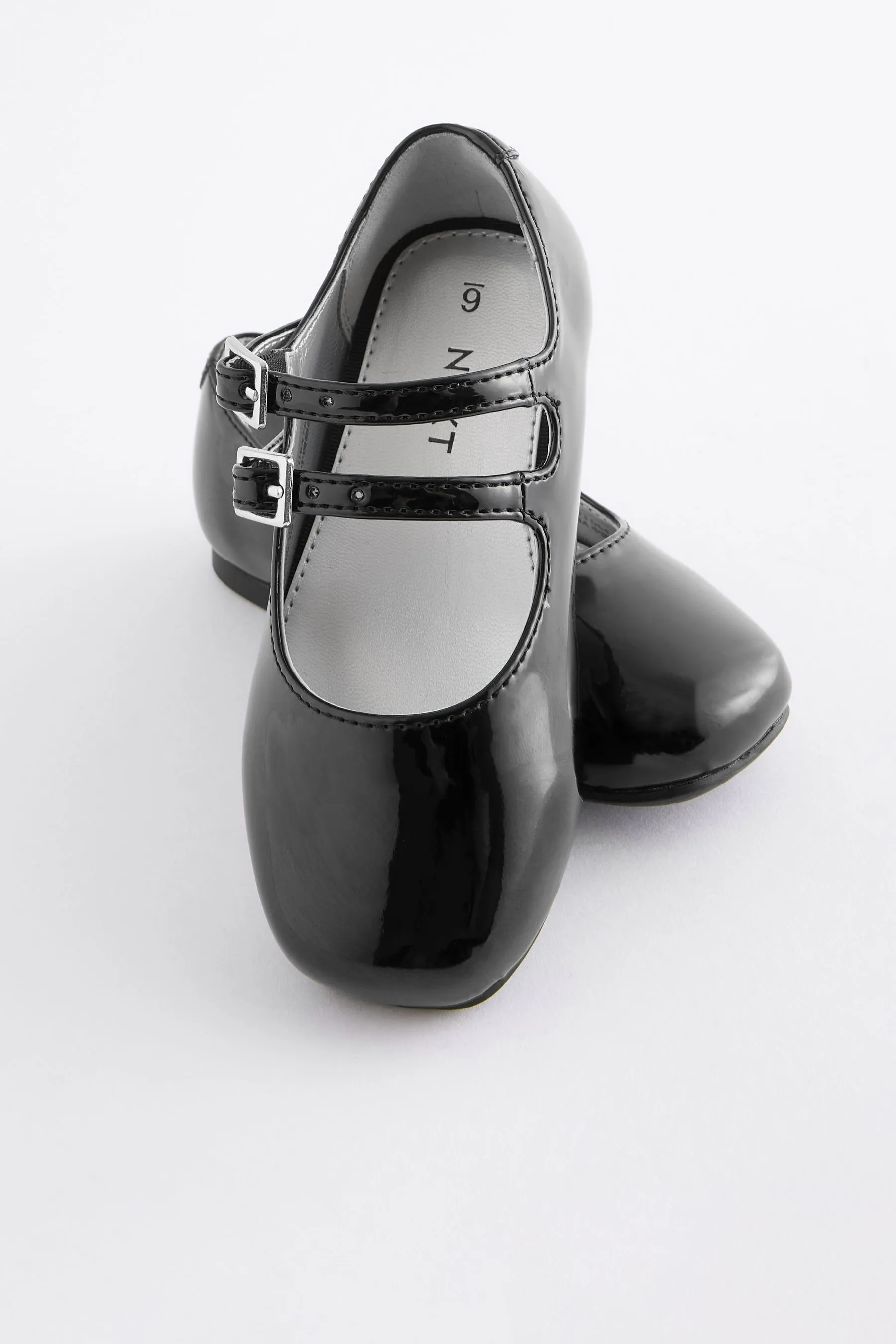 Scarpe con due cinturini    
