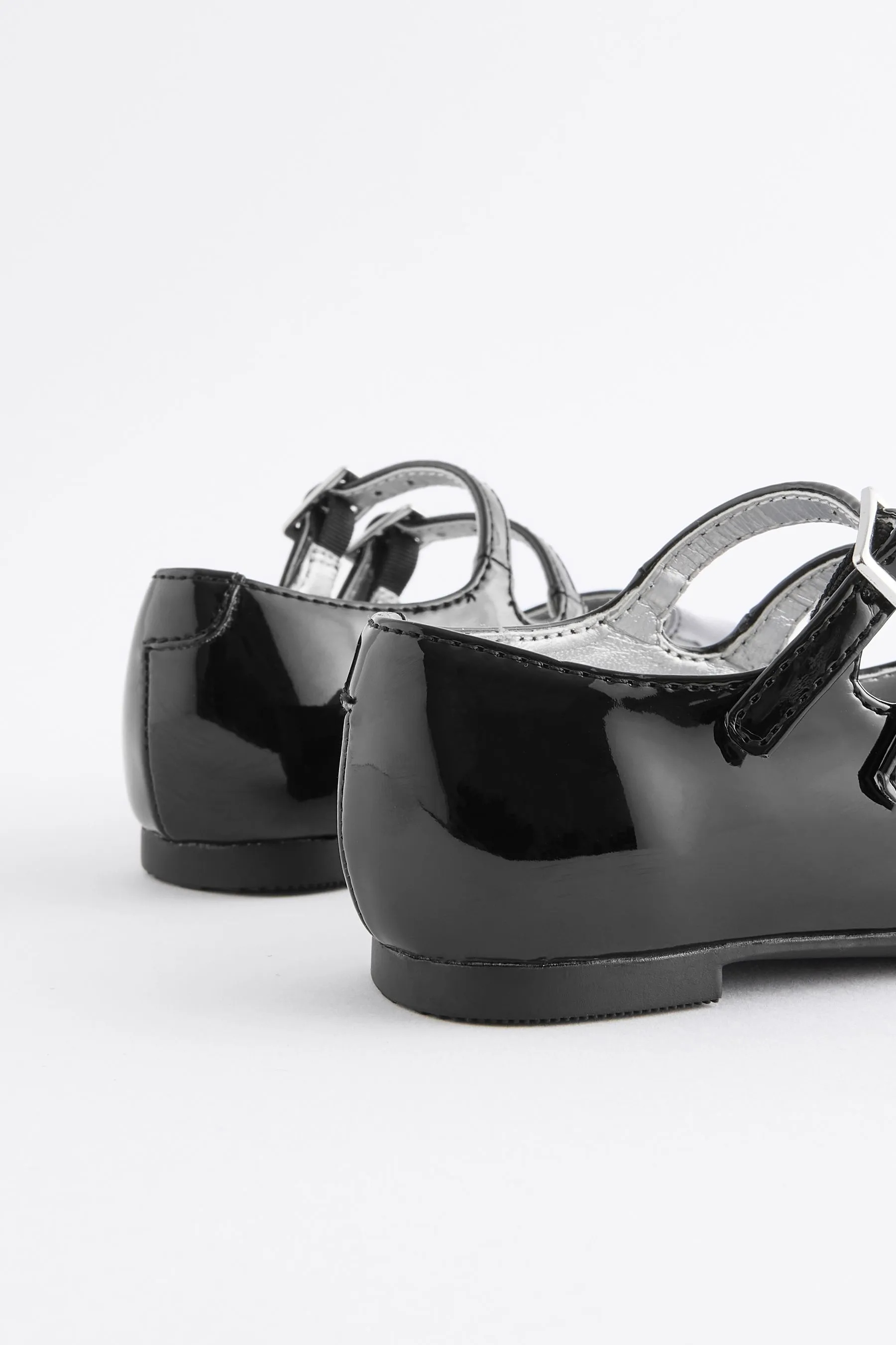 Scarpe con due cinturini    