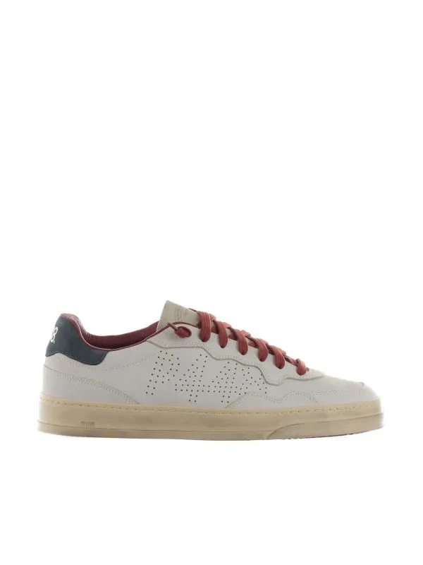 Sneaker in nabuk con logo traforato
