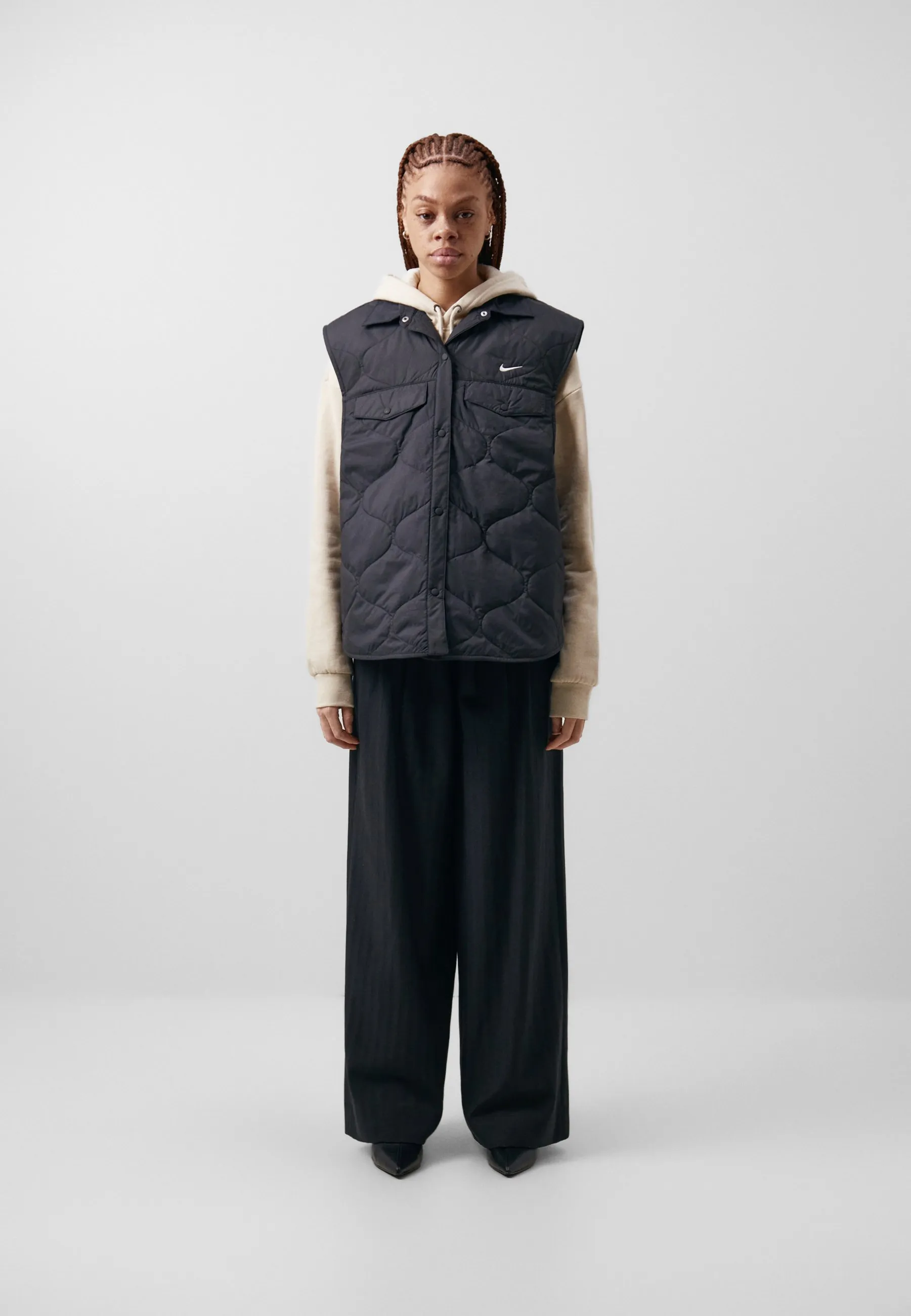 VEST - Smanicato