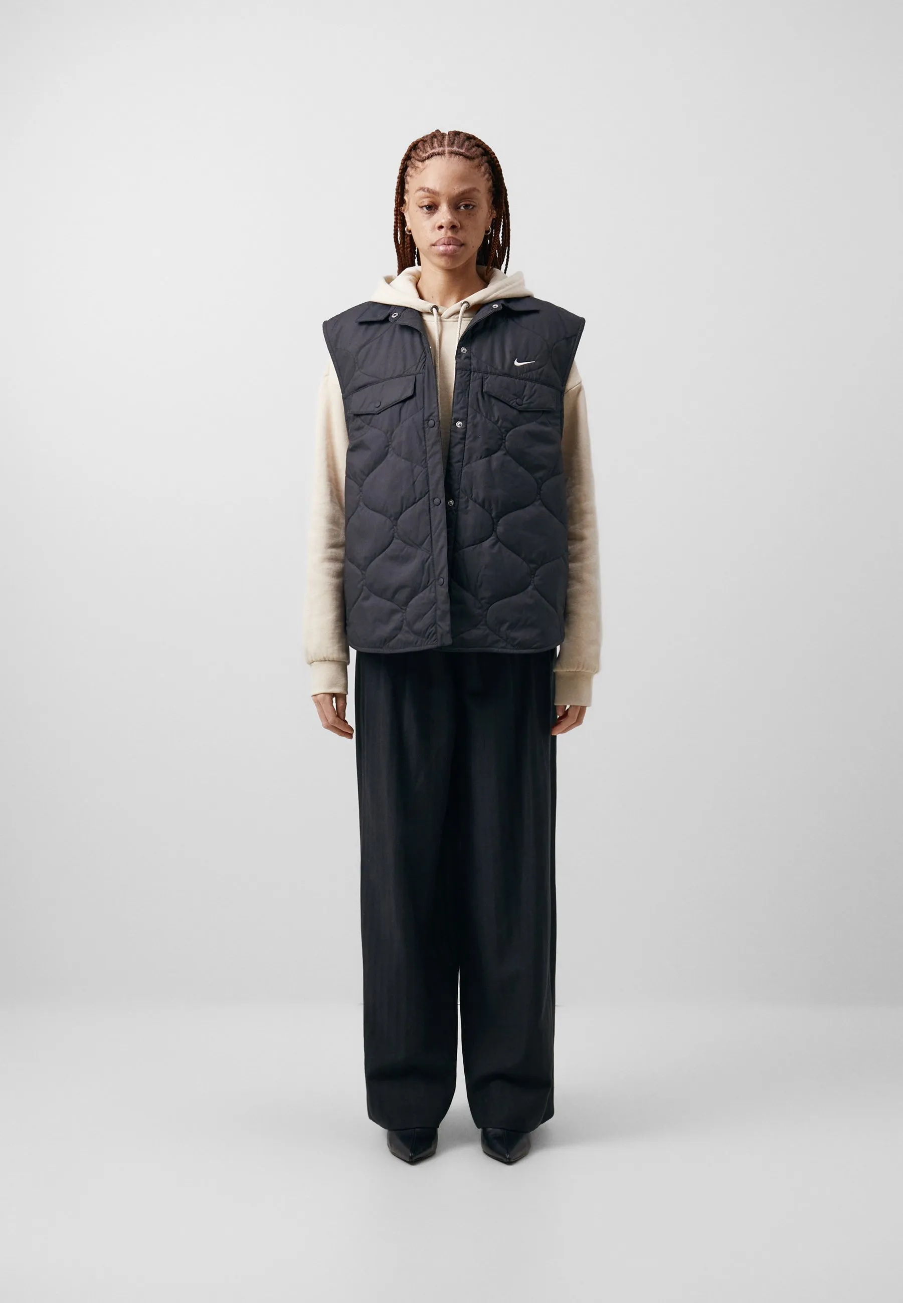 VEST - Smanicato